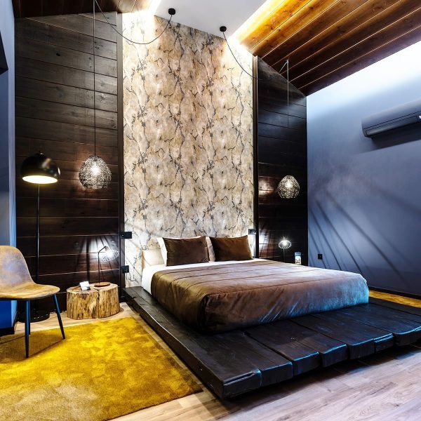 Arnaldo Azevedo Suite with sophisticated bed and décor