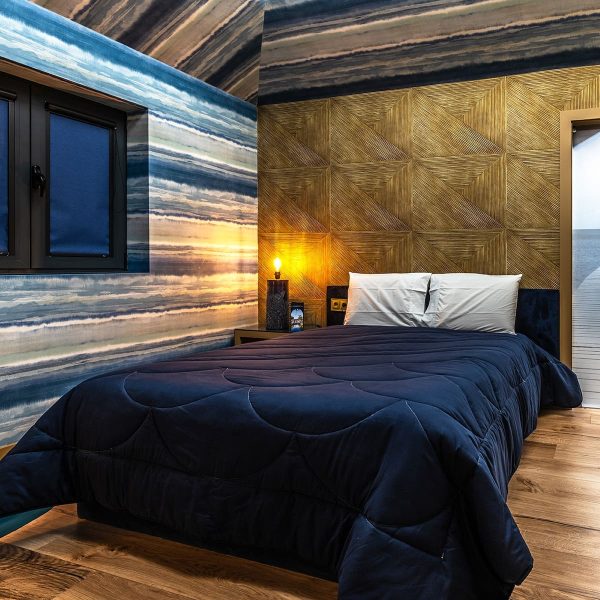 Suite Caban com cama acolhedora e tons naturais